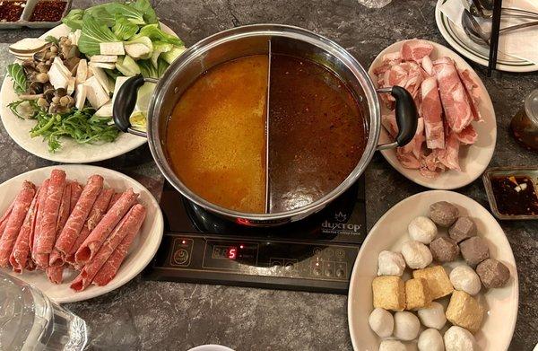 Hotpot  Left: Tom yom soup base Right: house special spicy base