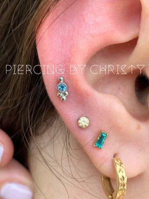 Solid 18k white gold Minerva with Swiss blue topaz by anatometal in mid helix