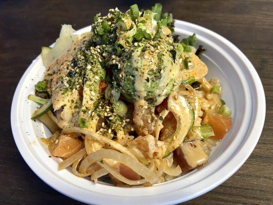 Large Bowl with Half and Half Base, salmon, spicy tuna, tuna, avocado, and all the toppings.