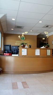 Clean front desk with orchids.