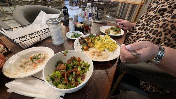 Fatoush salad with mixed grill platter in the back