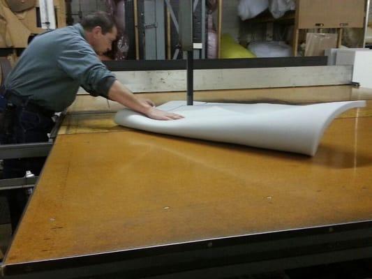 Cutting the foam to the shape of the headboard I'm upholstering