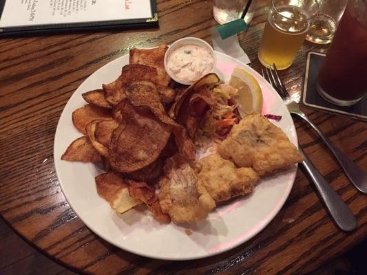 Chips with a side of cod. Tasty, but skimpy on the fish.