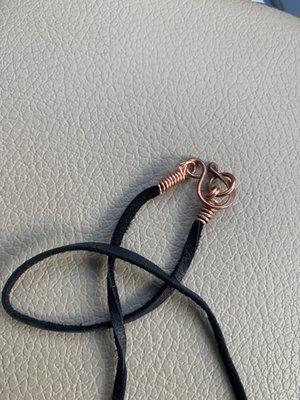 New copper clasp attached to leather by hand wrapping 20 AWG Cu wire.