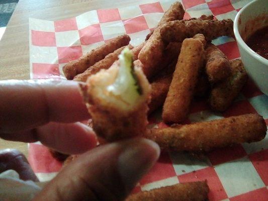 The zucchini sticks are really good. Served hot. I love the fresh zucchini peaking out.