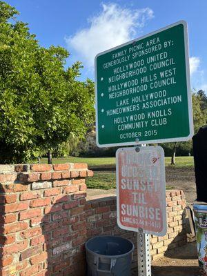 LA Municipal Code sign closed Sunset to Sunrise. Parking on the park side is No Parking 8p-6a.