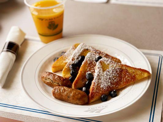 Amtrak's Signature Railroad French Toast (delicious!) and orange juice.