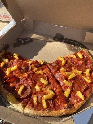 Cheese-less pepperoni and pineapple