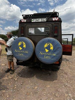 Our Safari vehicle with adventure Life tire covers!