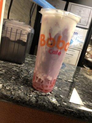 Large taro milk tea with milk cap and strawberry jelly