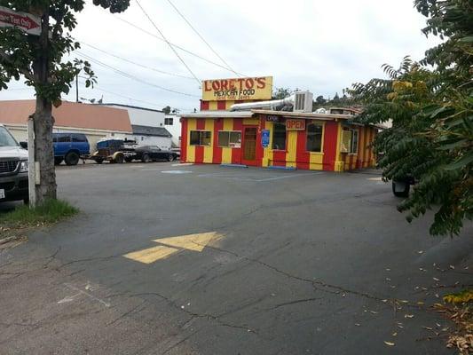 Smog shop is down alley behind Loreto's Mexican food, shown here