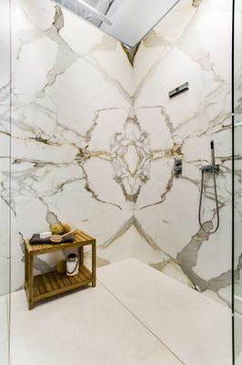 Calacatta Gold Borghini Extra marble quadmatched shower vignette.