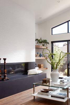 Fireplace in the open living room.