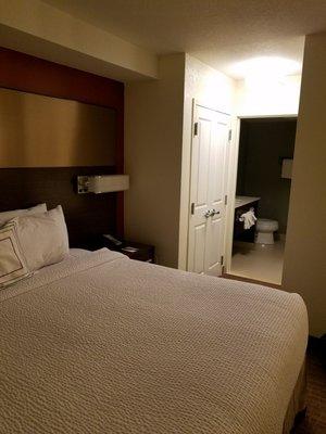 Room: king size bed and view of bathroom