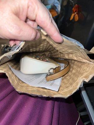 Supposed to get a NEW Coach purse with beautiful embroidery, but what I got was a USED Coach purse with dull colors and scuff marks!