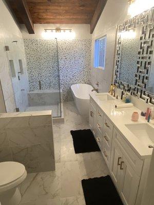 Picture of remodeled bathroom and custom glass job.