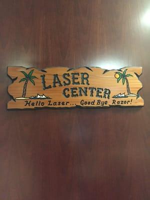 Hello laser, goodbye razor! Love the sign!