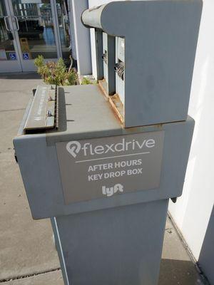 The only locked dropbox with signage for Flexdrive and Lyft but nowhere does it say Caliber.