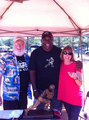 the wife and i with george rogers football great jackie is wearing his rings!