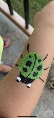 The one & only Green Ladybug! From the face/arm painting station.. & a super hairy toddler arm