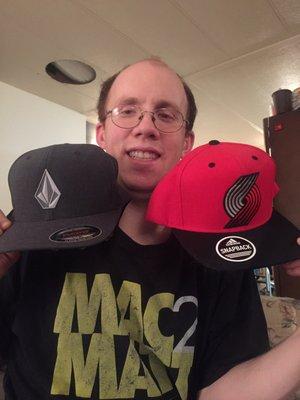 My husband and his new hats.