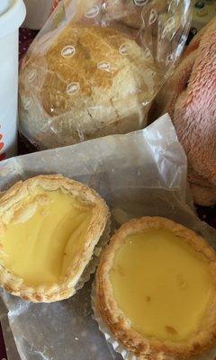 Lemon bun ($1.30); egg tarts ($1.10/ea OR 2 for $2)