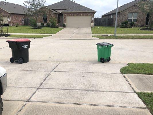 I put my trash cans on the left of my driveway but when put back it's in the middle of my driveway