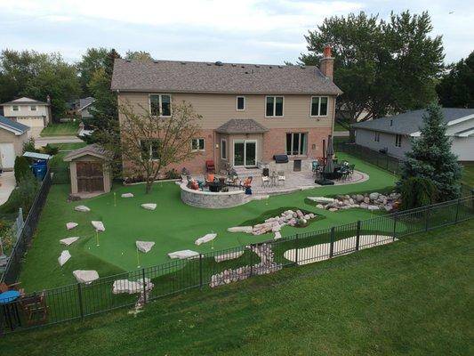 Dream backyard with river and many putting greens!