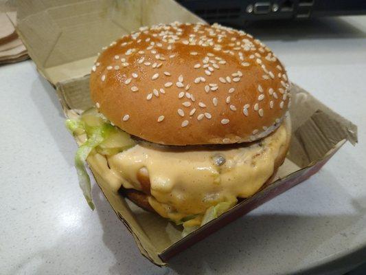 How not to assemble a Big Mac (hint: the Mac Sauce goes on the inside). The box was also covered in grease, so I asked them to remake it.