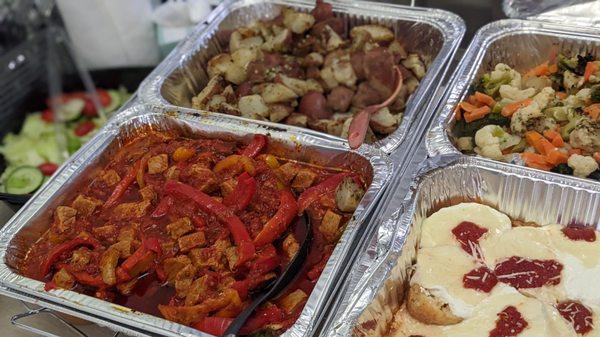 Veal and pepper, roasted potatoes, roasted vegetables, rice balls