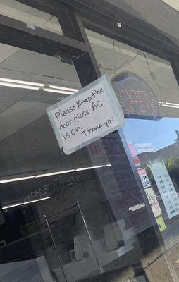 The fact that this sign is up & it's so hot inside the Laundry room than outside is a joke.