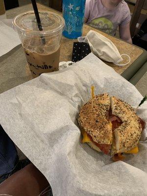 Bagel sandwich & 1/2 sweet vanilla/caramel quad latte