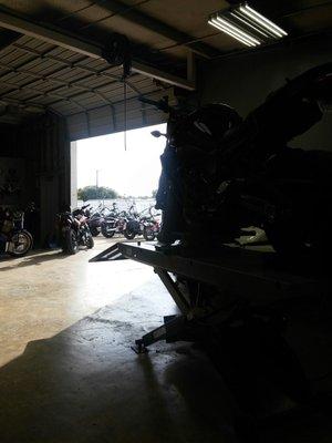 Very nice garage.  They work on all bikes.  Hard to see my FZ8 in the foreground because of lighting.