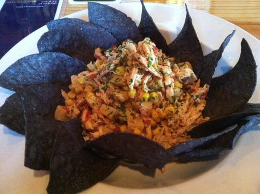 Salpicon Pibil - marinated shredded chicken pibil style, roasted corn, green onion, potatoes, and roasted red peppers.