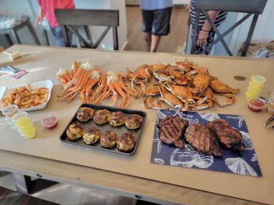 Blue crabs, crab legs, steamed shrimp, crab cakes.