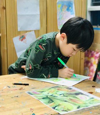 Our Mini Maker working hard on his beautiful drawing!