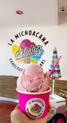 Mango sherbet and a strawberry creme double scoop.