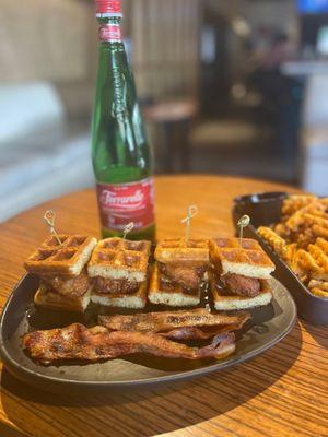 Chicken and waffles sliders with a side of bacon