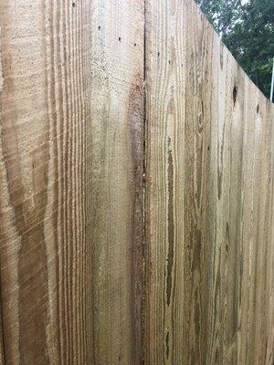 Gap in the panel that is pulling away from our fence that is less than 12 months old