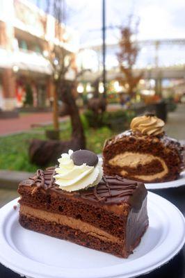 Dark Chocolate Mousse Cake: dense chocolate cake, dark chocolate cream topped with whipped cream & chocolate pieces ($5.10).