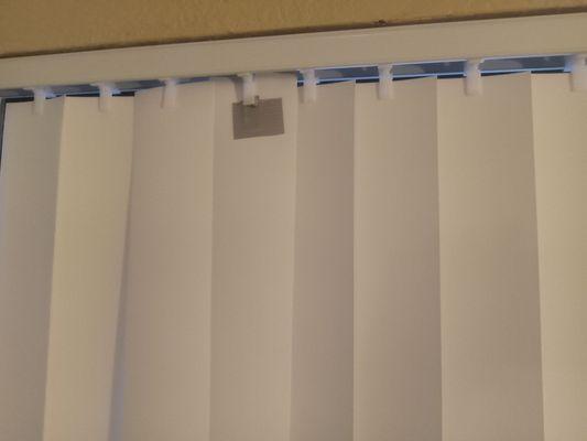 Tape holding blind on when I moved in, they said we will fix it and no one showed up