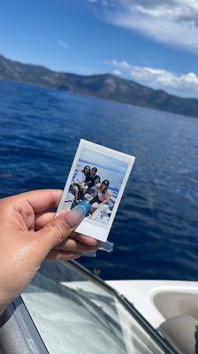 A picture of a picture of us on the boat.