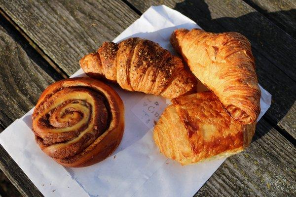 Cinnamon roll, zaatar croissant, croissant, pain au chocolat