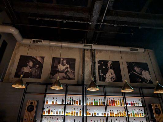 Paintings/photos above the bar