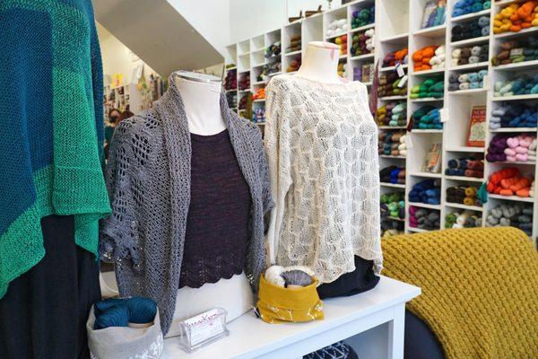 Our front display usually hosts a revolving trunk show from various designers to help you see yarns worked up in person.