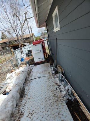 Getting into the back yard gates are no problem for the spider lift. #Apexarborservices.com