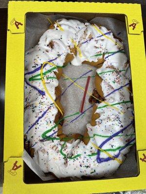 Traditional cinnamon swirl King cake