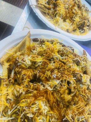 Chile cheese fries with brisket and red Chile