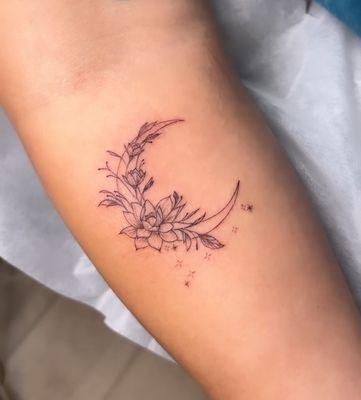 Fine line tattoo done by Joanne