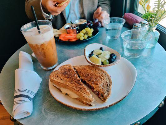 Beet Ruben sandwich with iced latte